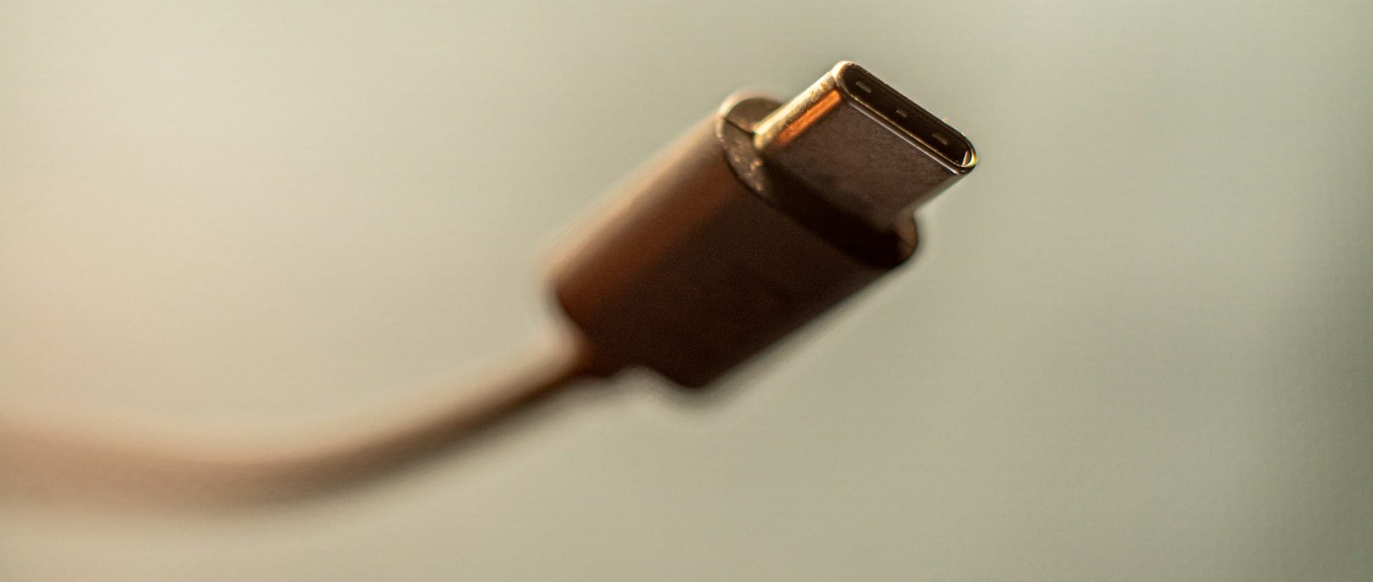 white usb cable on white surface